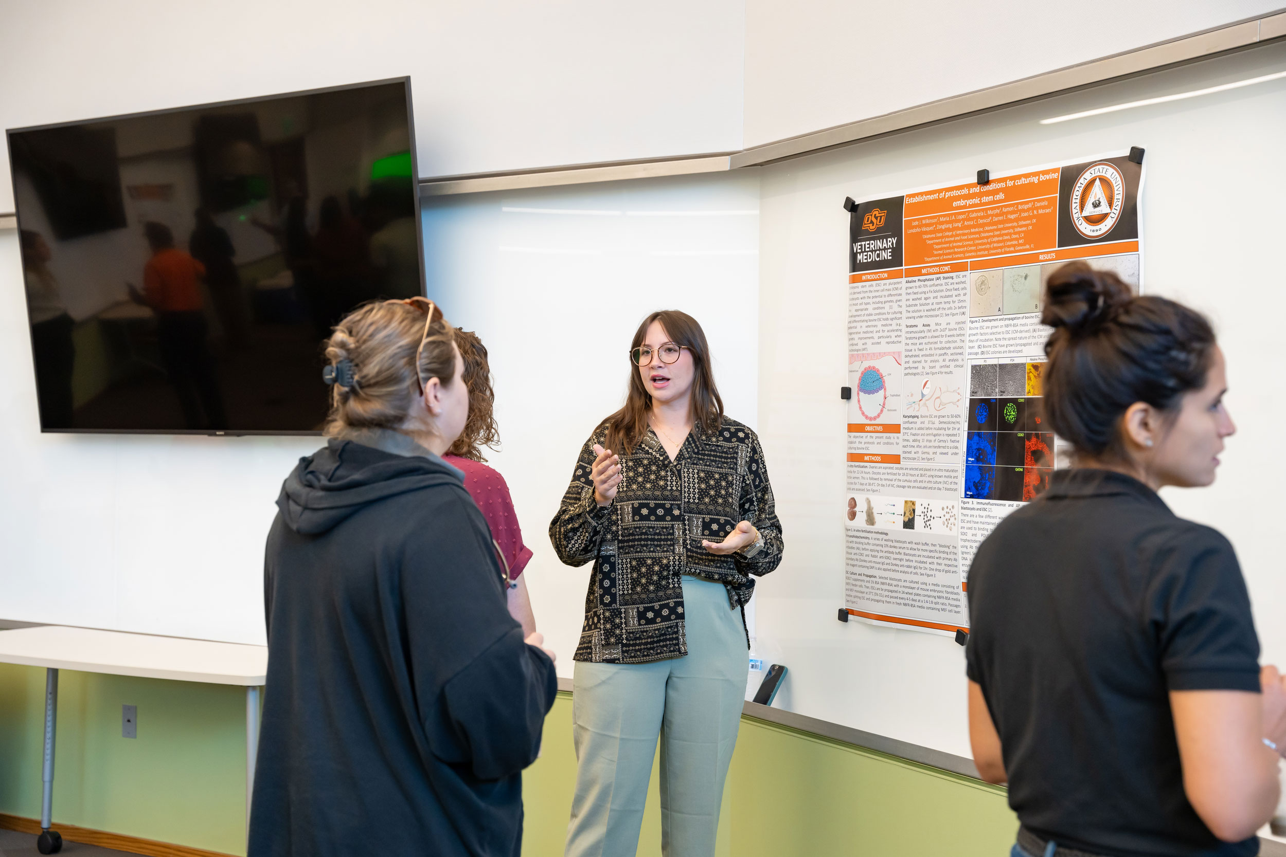 Student making a presentation during VetMed Poster Day