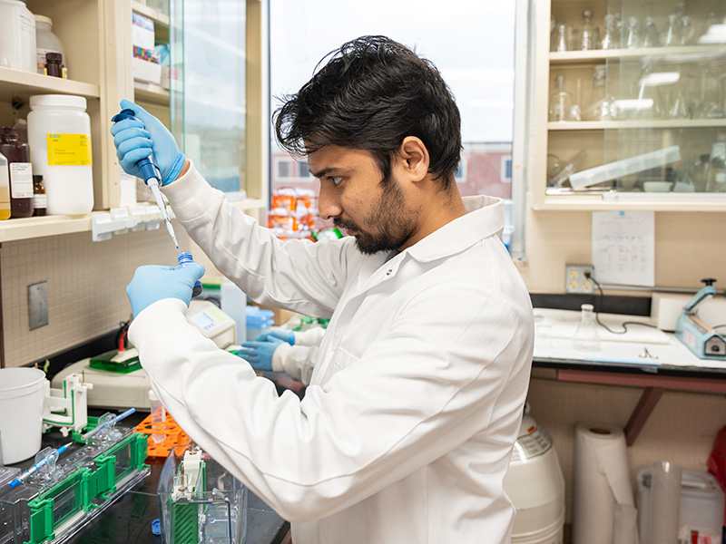 A man works in a lab setting