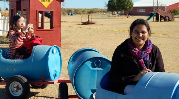 girls ride in little train