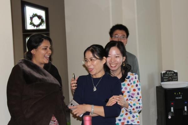 Amy, Nicole, and Kumari hugging