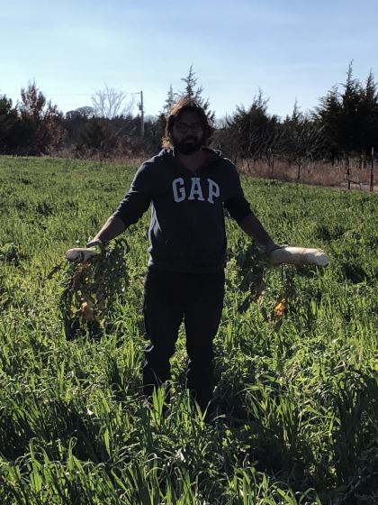 girish patel poses with his radishes