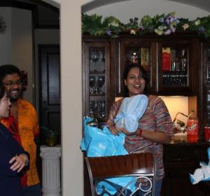 Kumari receives a baby blanket