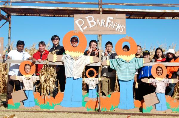 Lab member pose for a group photo at P-Bar Farms